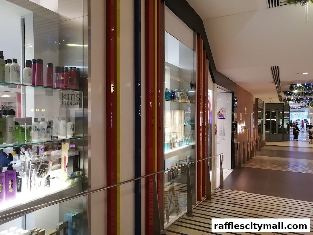 A brightly lit salon interior with shelves displaying hair products and a colorful facade.