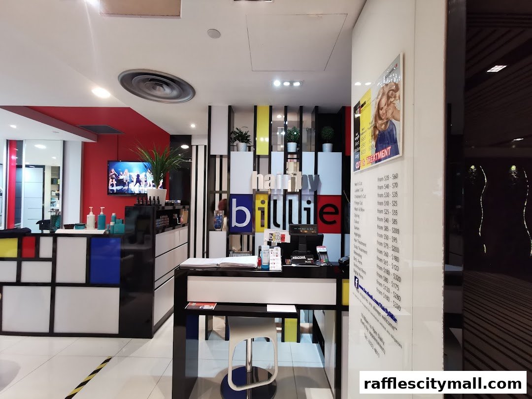 Interior of a modern hair salon with a reception desk and colorful decor.