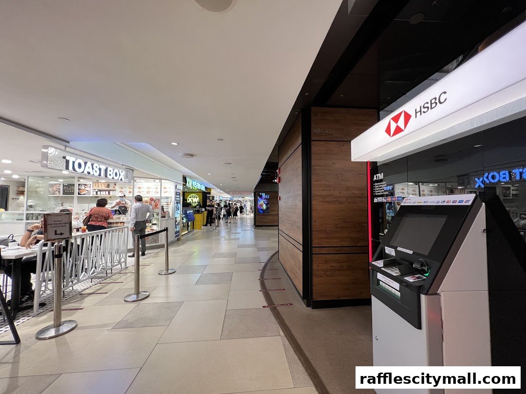 A view of the HSBC bank branch and ATM in a shopping mall corridor.