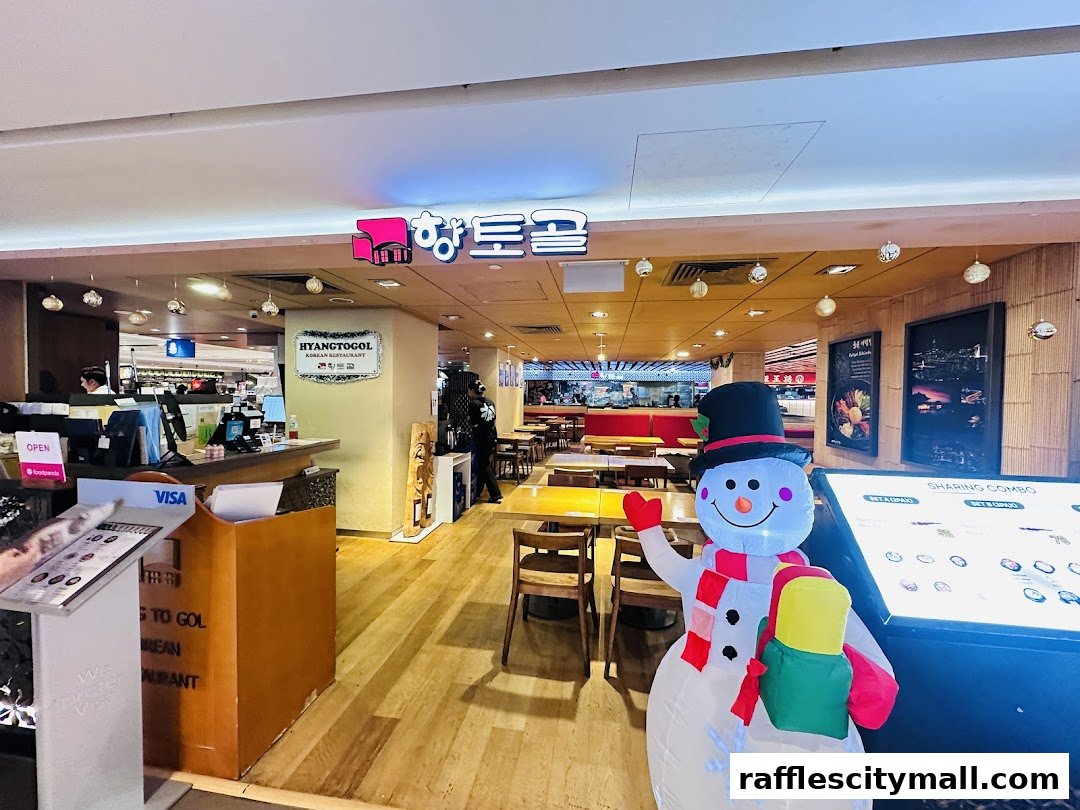 The entrance of Hyang-to-gol Korean Restaurant with a festive snowman decoration.