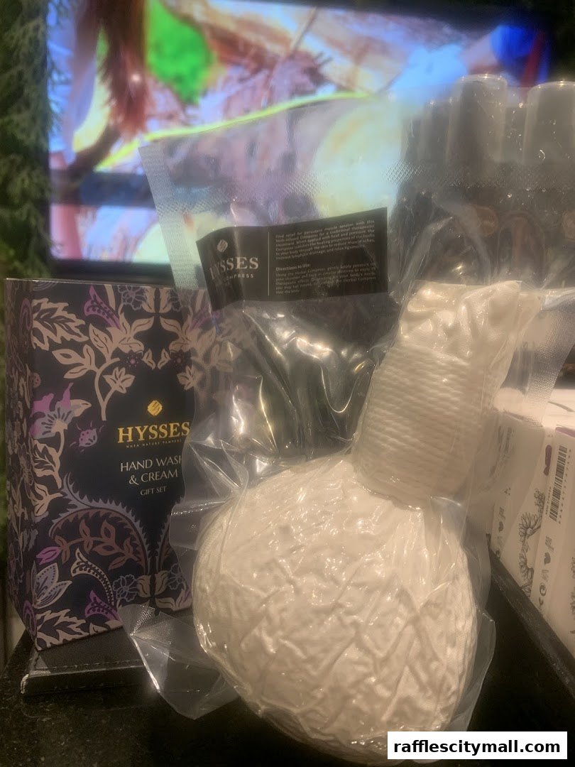 A HYSSES Hand Wash & Cream Gift Set and a herbal compress are displayed.
