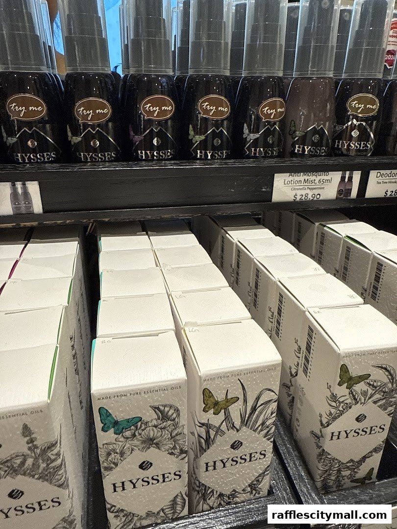 Shelves stocked with bottles and boxes of HYSSES brand essential oil products.