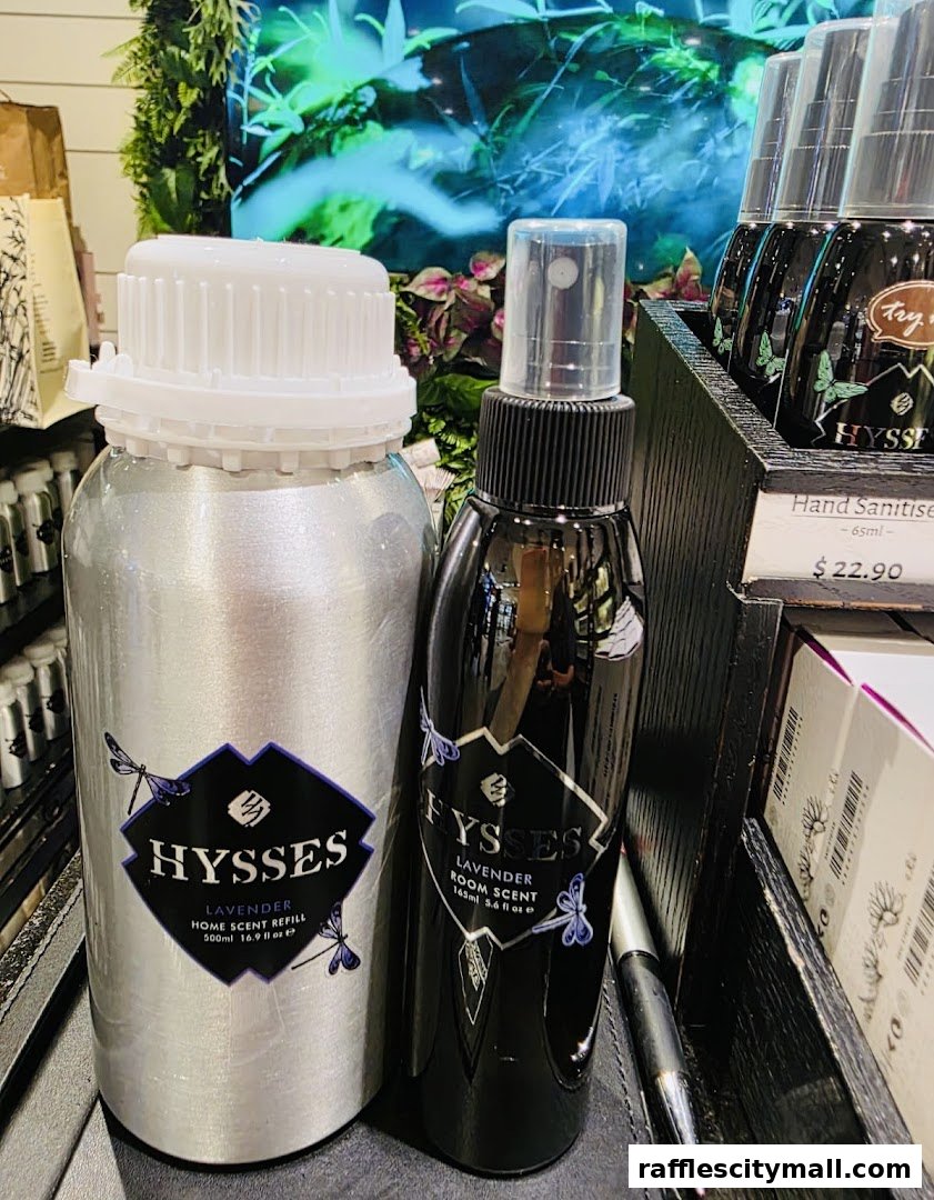 Two bottles of HYSSES lavender home scent products and hand sanitizer on display.