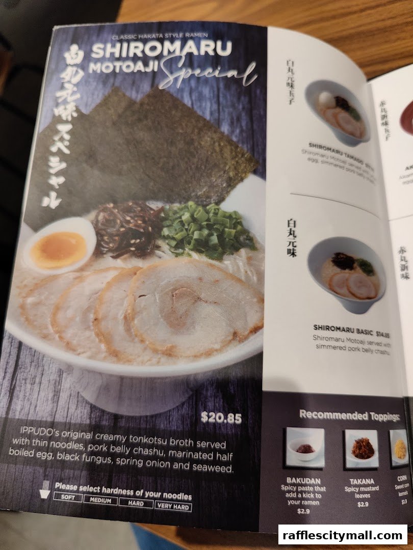 A menu featuring Shiromaru Motoaji Special ramen with detailed descriptions and prices.