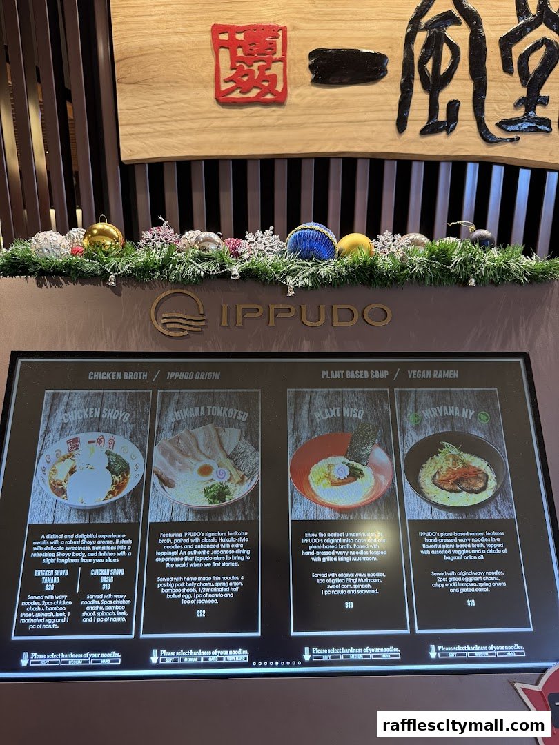 A menu display for IPPUDO Raffles City featuring four ramen options with descriptions and prices.