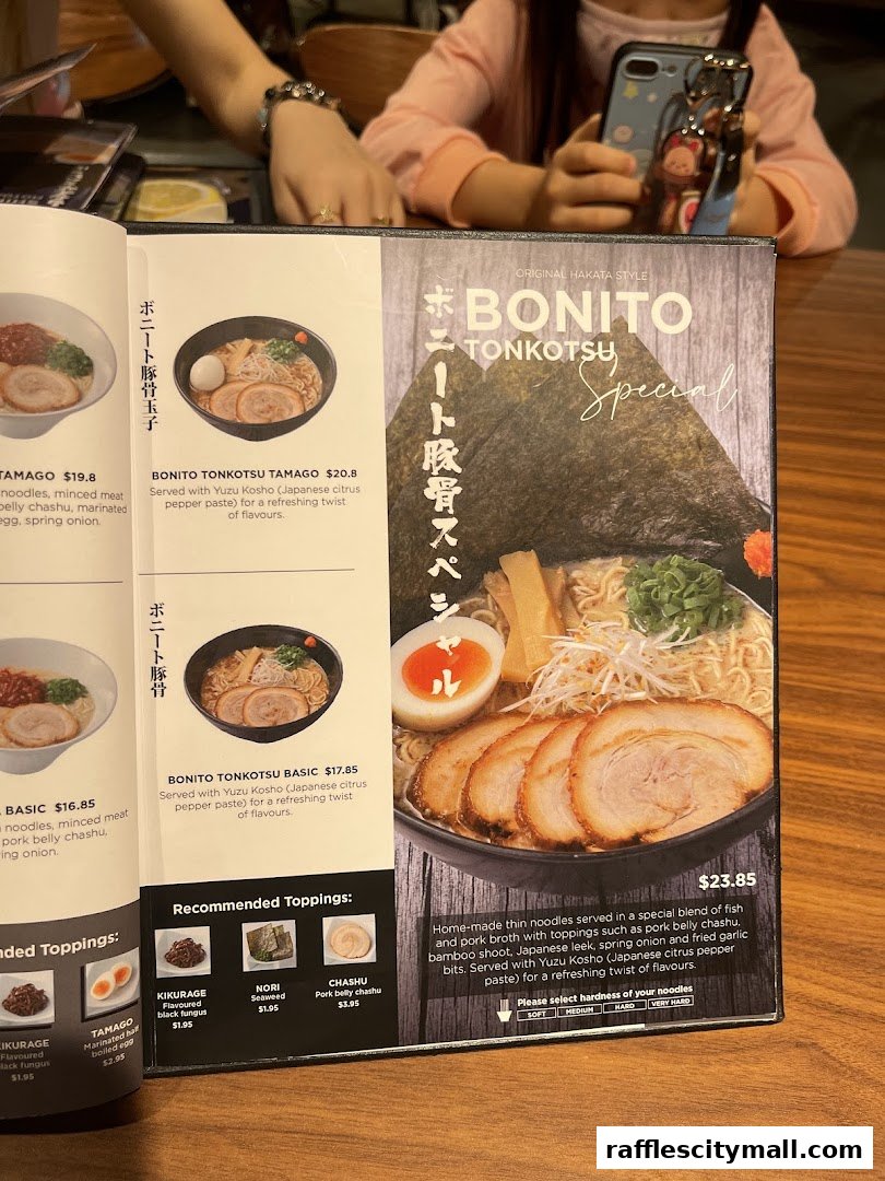 A menu featuring different types of ramen with descriptions and prices.