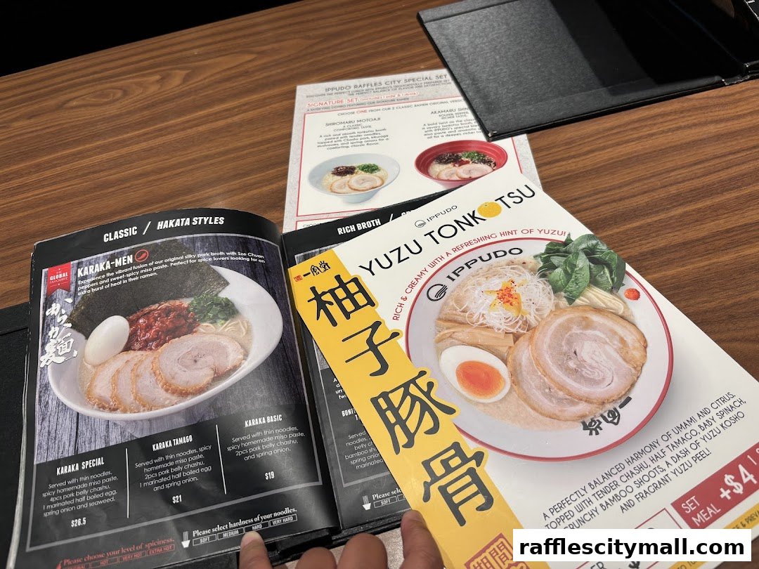 A close-up of an IPPUDO ramen menu featuring various ramen dishes and their descriptions.