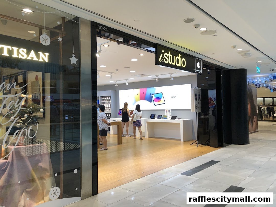 The iStudio Apple Premium Reseller store entrance with iPads displayed.