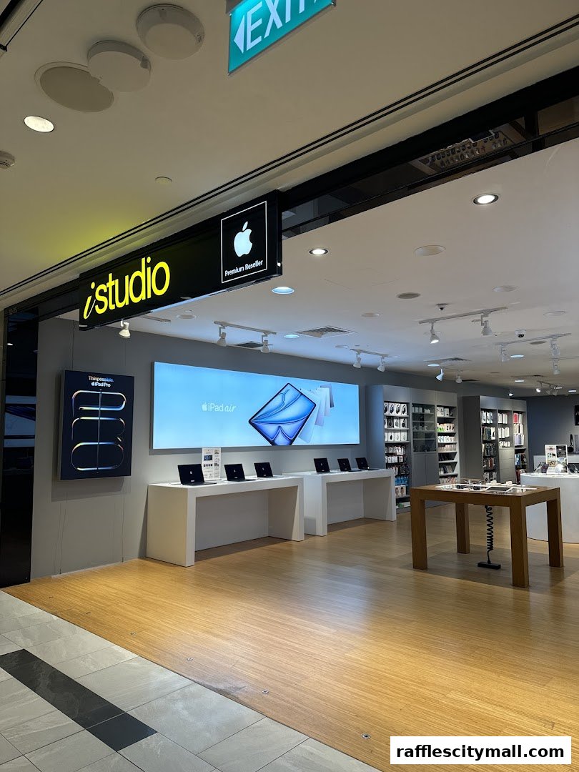 Interior view of an iStudio Apple Premium Reseller store showcasing Apple products.