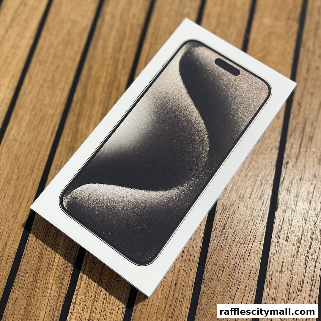 A close-up shot of an iPhone 14 Pro box on a wooden surface.