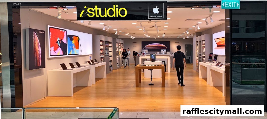 Interior view of an iStudio Apple Premium Reseller store showcasing Apple products.