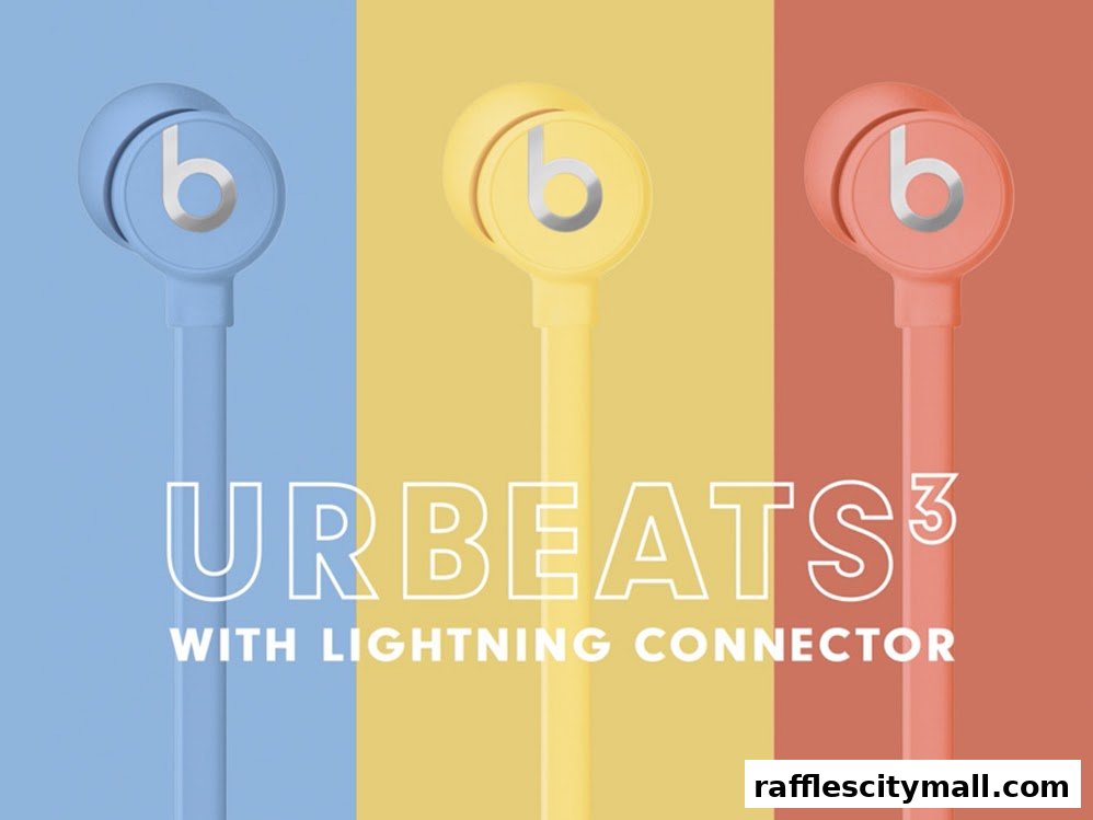 Three pairs of colorful Beats urBeats3 earphones with lightning connectors displayed.