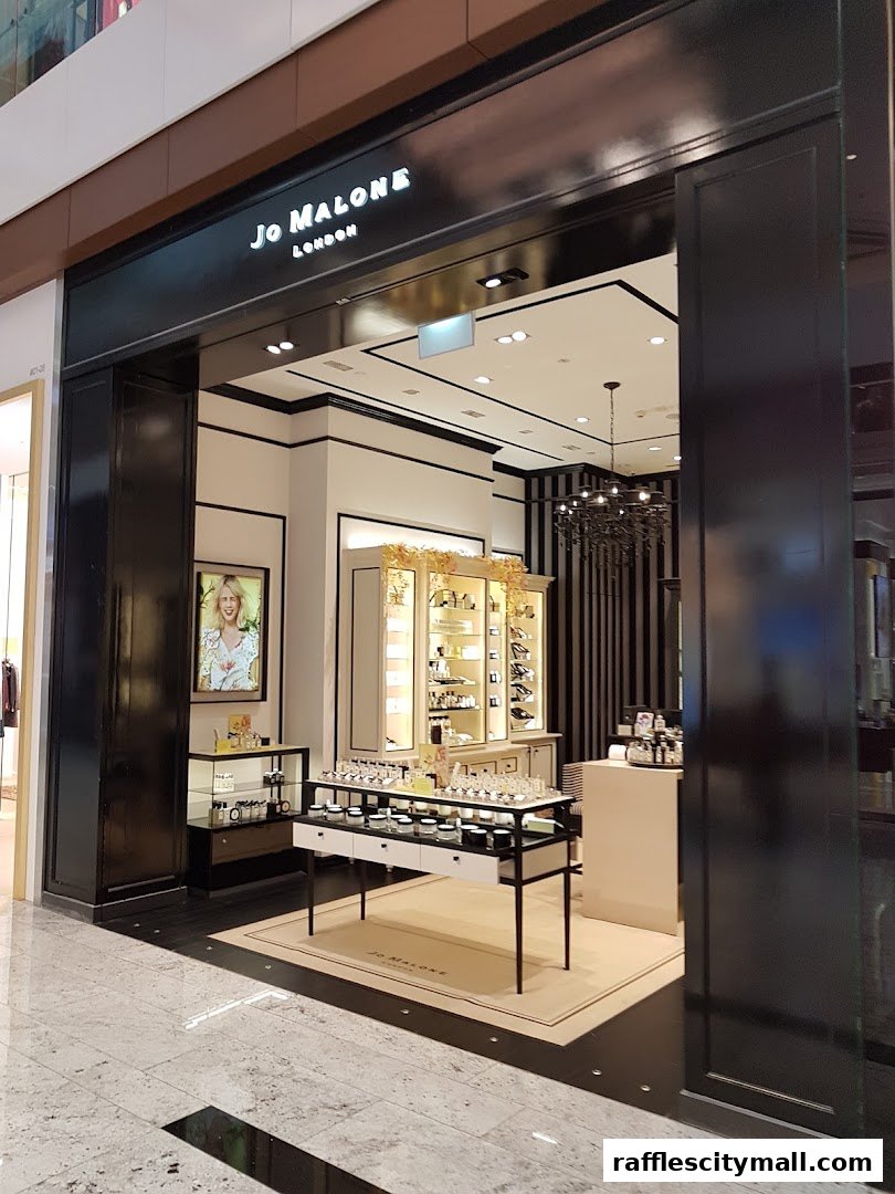 The elegant Jo Malone London store entrance with illuminated signage and product displays.