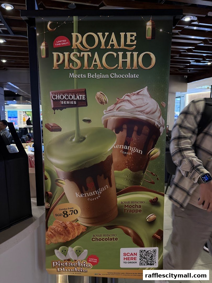 A promotional banner for Kenangan Coffee's Royale Pistachio drinks and chocolate.