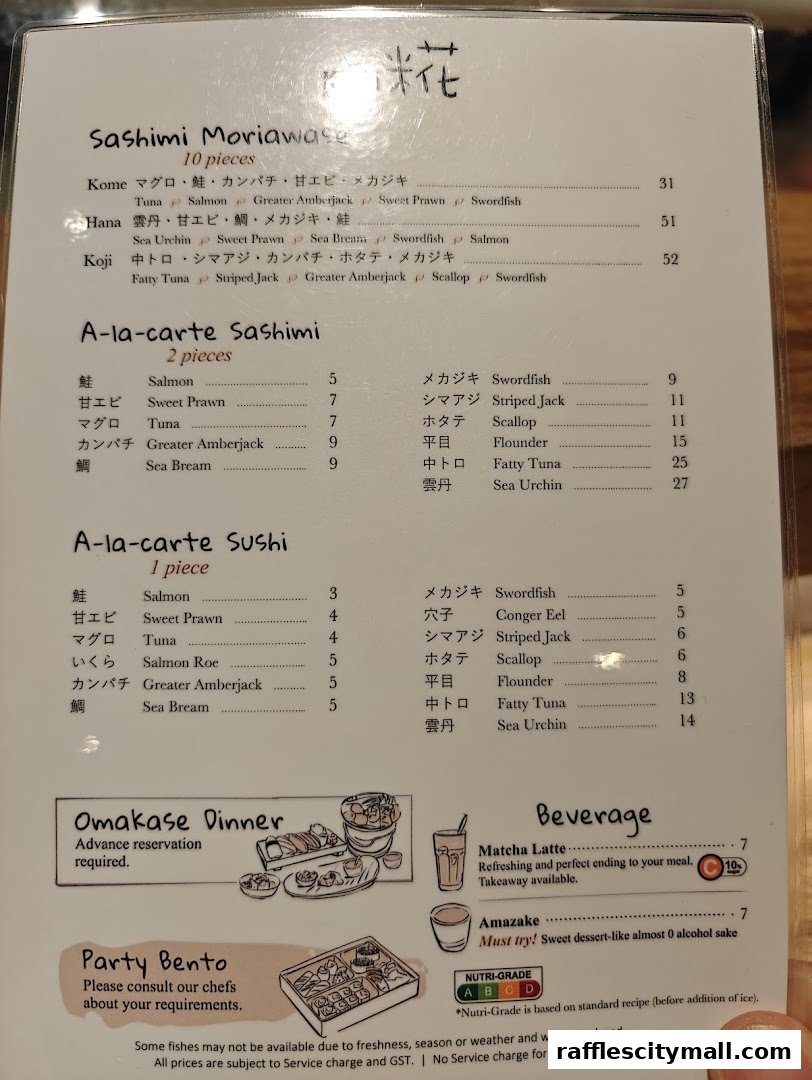 A menu from Koji Sushi Bar featuring sashimi, sushi, beverages, and bento boxes.