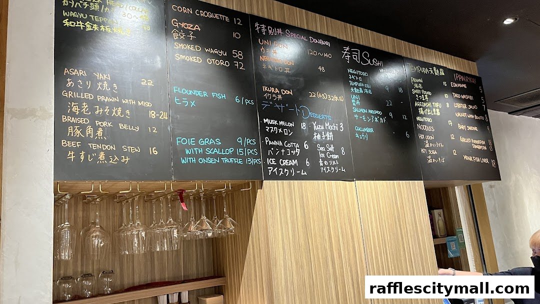 A chalk menu board displaying various Japanese dishes and desserts with prices.