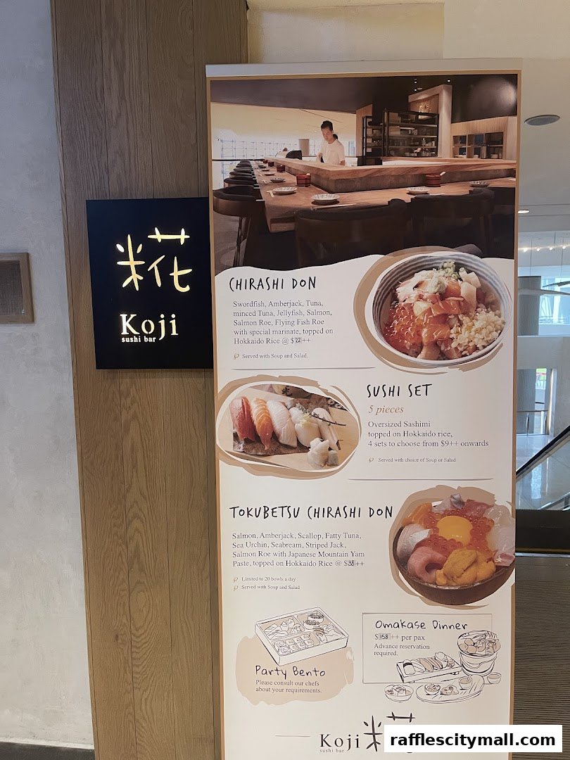 A menu board for Koji Sushi Bar featuring Chirashi Don, Sushi Sets, and Omakase Dinner.