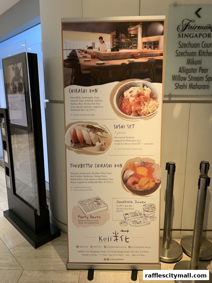 A promotional banner for Koji Sushi Bar featuring various sushi dishes and bento boxes.