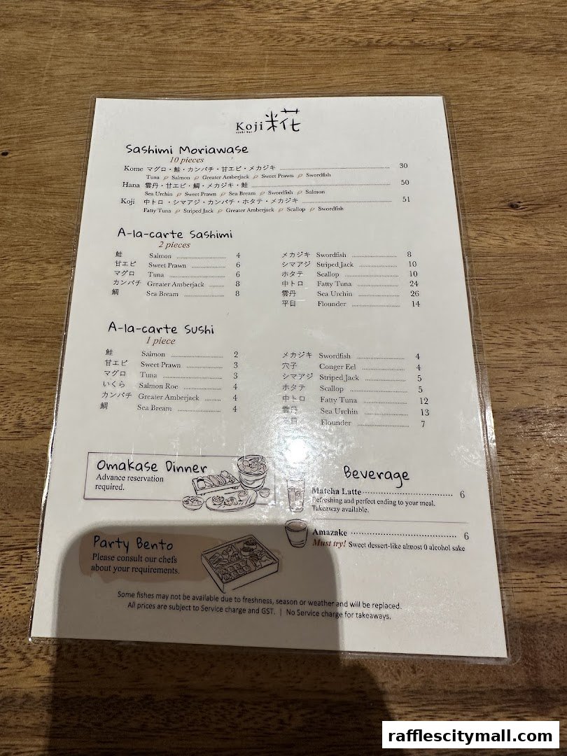 A menu from Koji Sushi Bar featuring sashimi, sushi, omakase, and beverages.