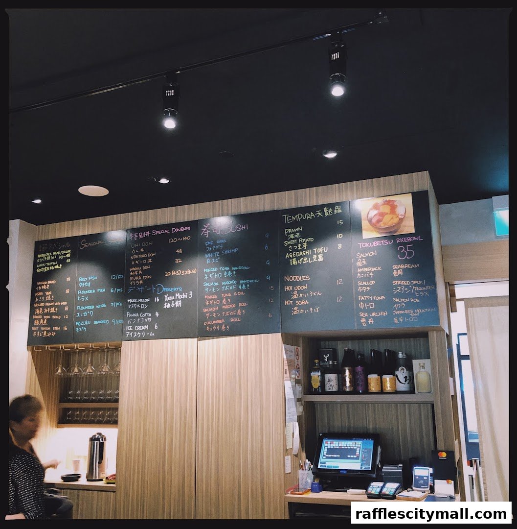 A menu board displaying various sushi, donburi, tempura, and rice bowl options with prices.