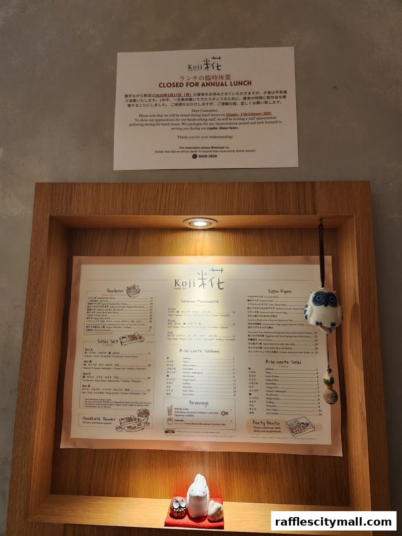 A menu for Koji Sushi Bar is displayed, featuring various sushi sets, sashimi, and beverages.