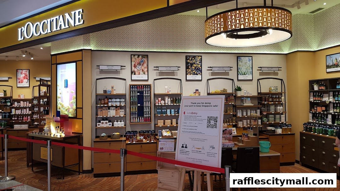 Interior view of a L'Occitane store showcasing skincare and body care products on shelves.