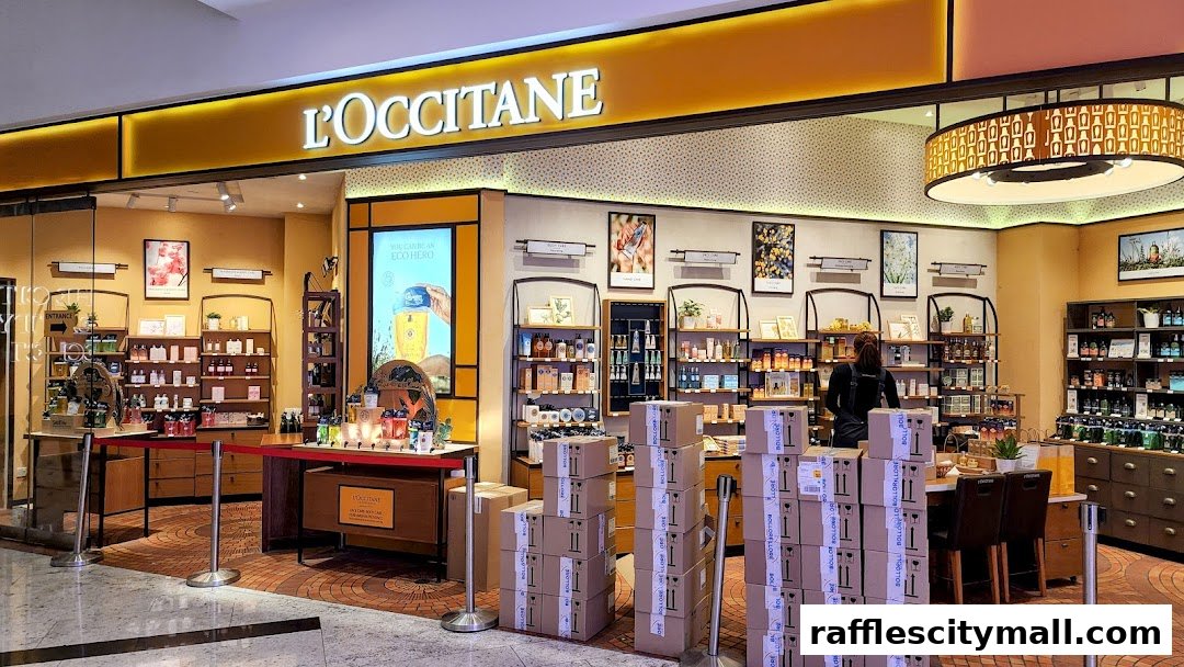 The L'Occitane shop front displays a wide array of skincare and beauty products on shelves and counters.