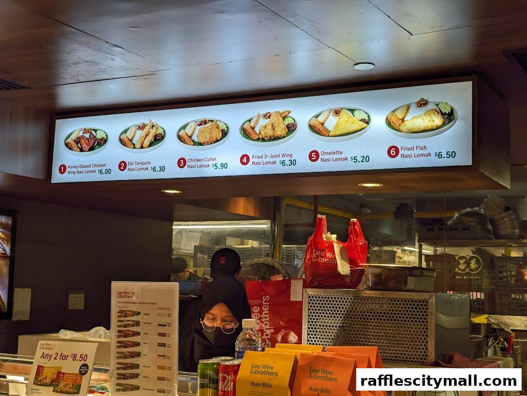 A brightly lit menu board displaying various Nasi Lemak dishes with prices.