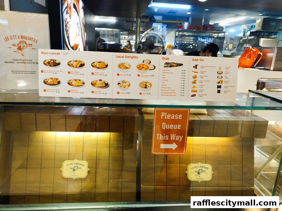 A menu board displaying various Nasi Lemak, Local Delights, Otah, and Add-On items with prices.