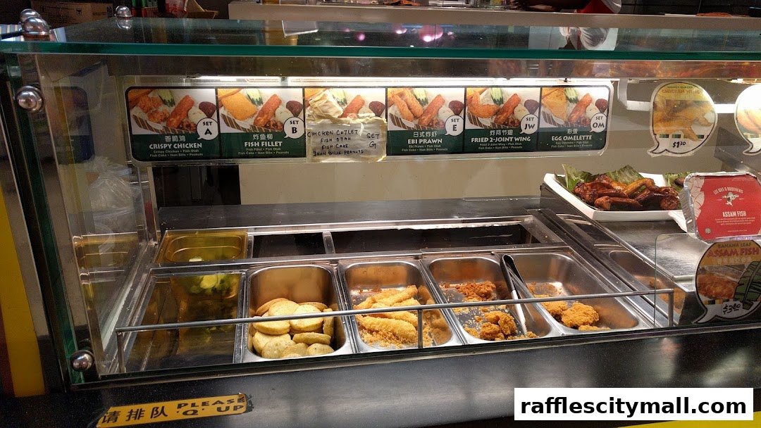 A display case filled with various fried food items and menu sets from Lee Wee Brothers.