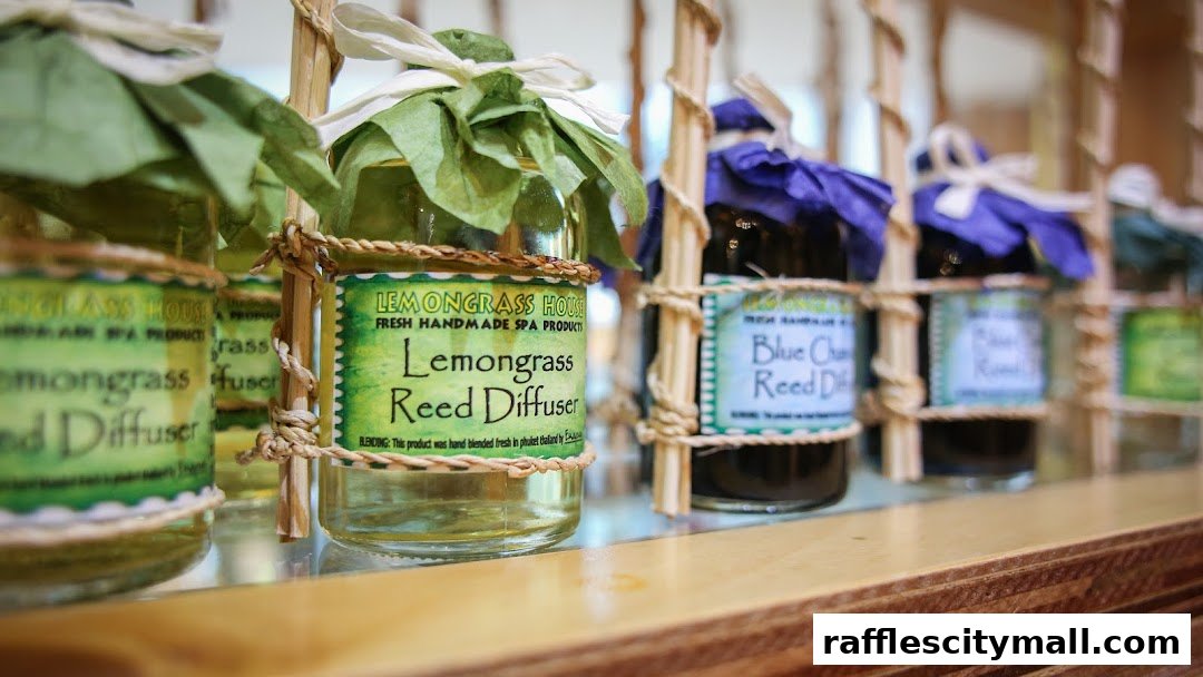 Close-up of Lemongrass House reed diffusers with natural packaging.