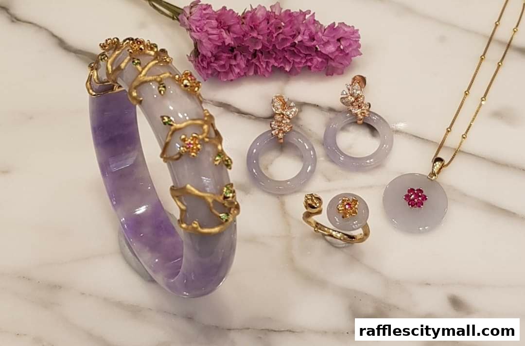 A collection of exquisite jade jewelry, including a bracelet, earrings, ring, and pendant, adorned with gold and gemstones.