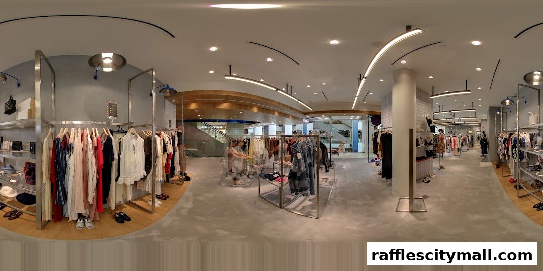 Interior view of a modern clothing boutique with racks of apparel and accessories.