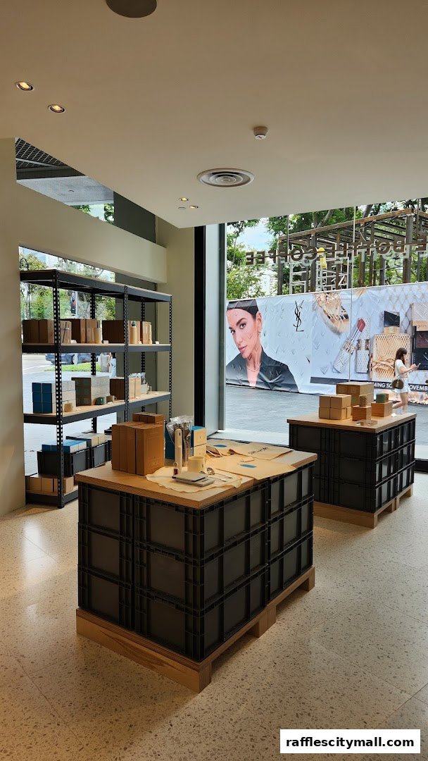 Interior view of a modern retail store with shelves displaying products and a large window with an advertisement.