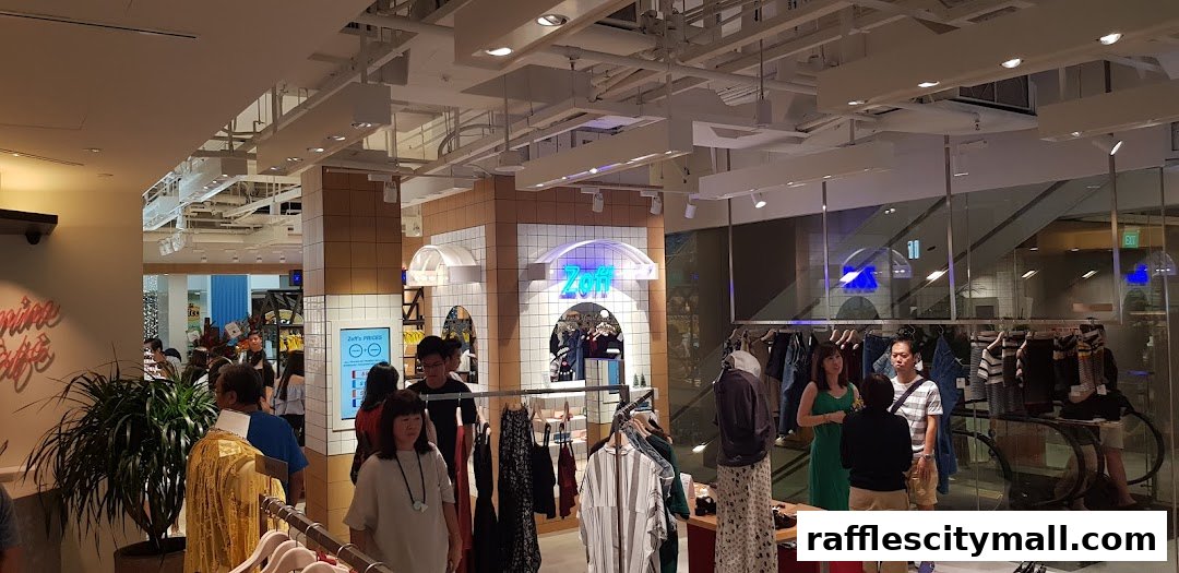 Interior view of a clothing store with racks of apparel and customers browsing.
