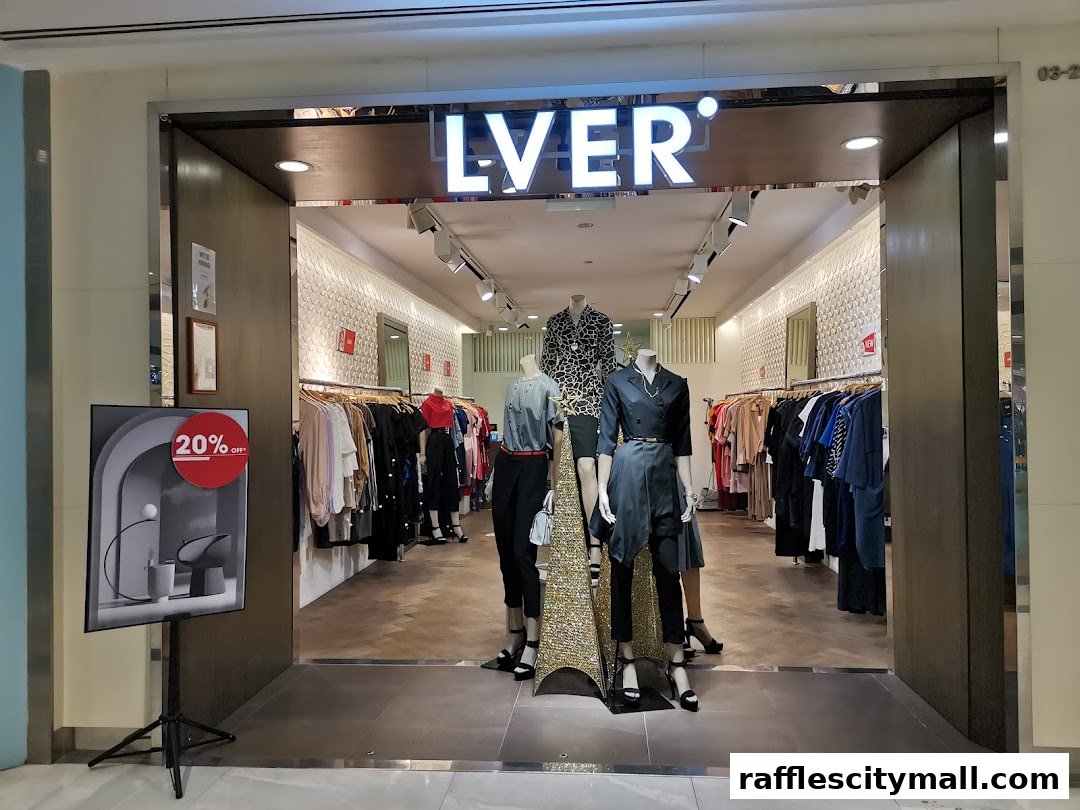 The entrance of the LVER Raffles City fashion store, showcasing mannequins and clothing displays.