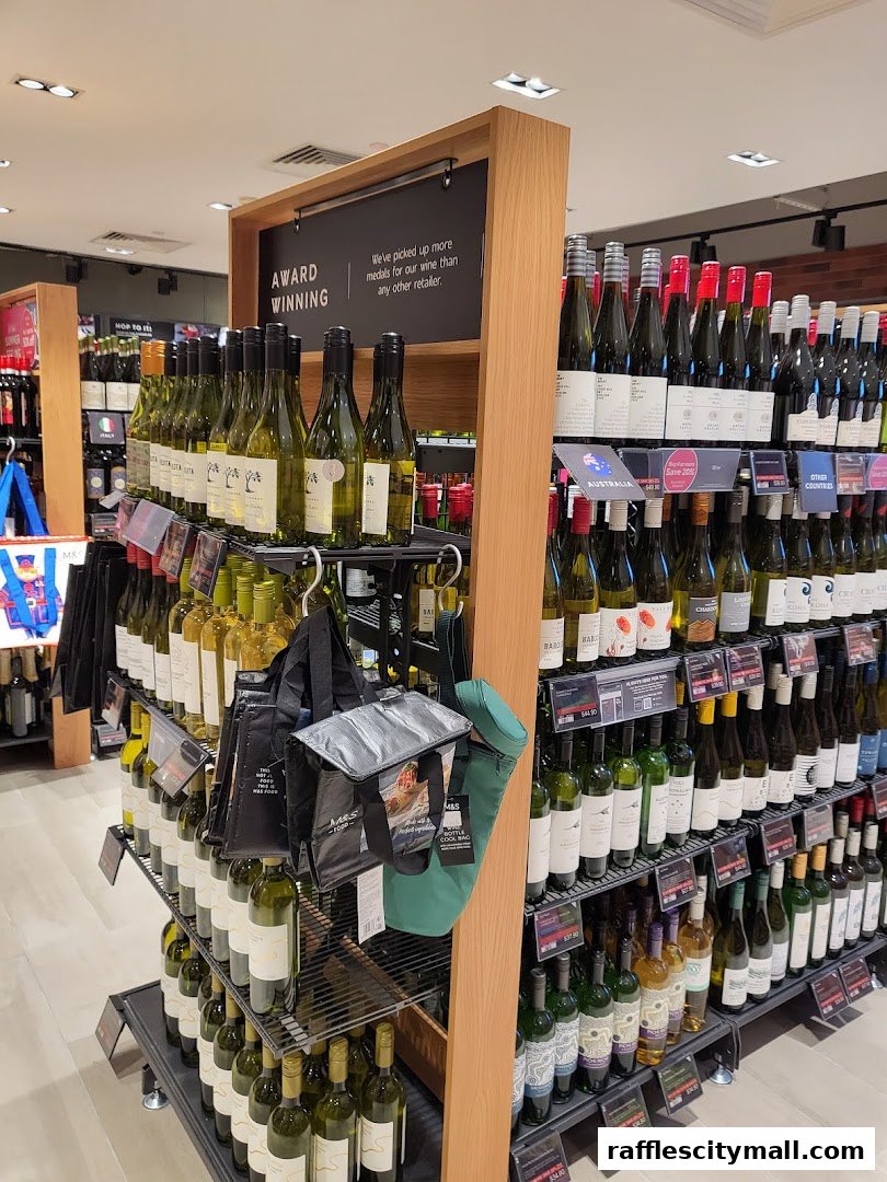 A display of wine bottles in a retail store, with a sign highlighting award-winning selections.