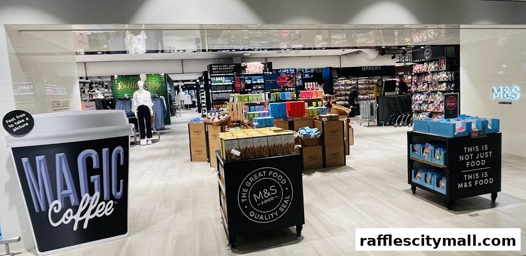 Interior view of a Marks & Spencer store showcasing food products and clothing displays.