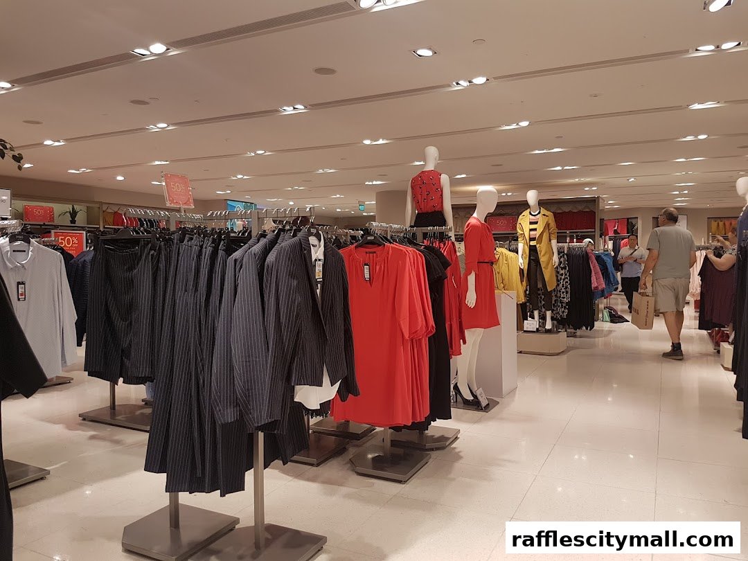 Interior view of a Marks & Spencer store with clothing displays and mannequins.