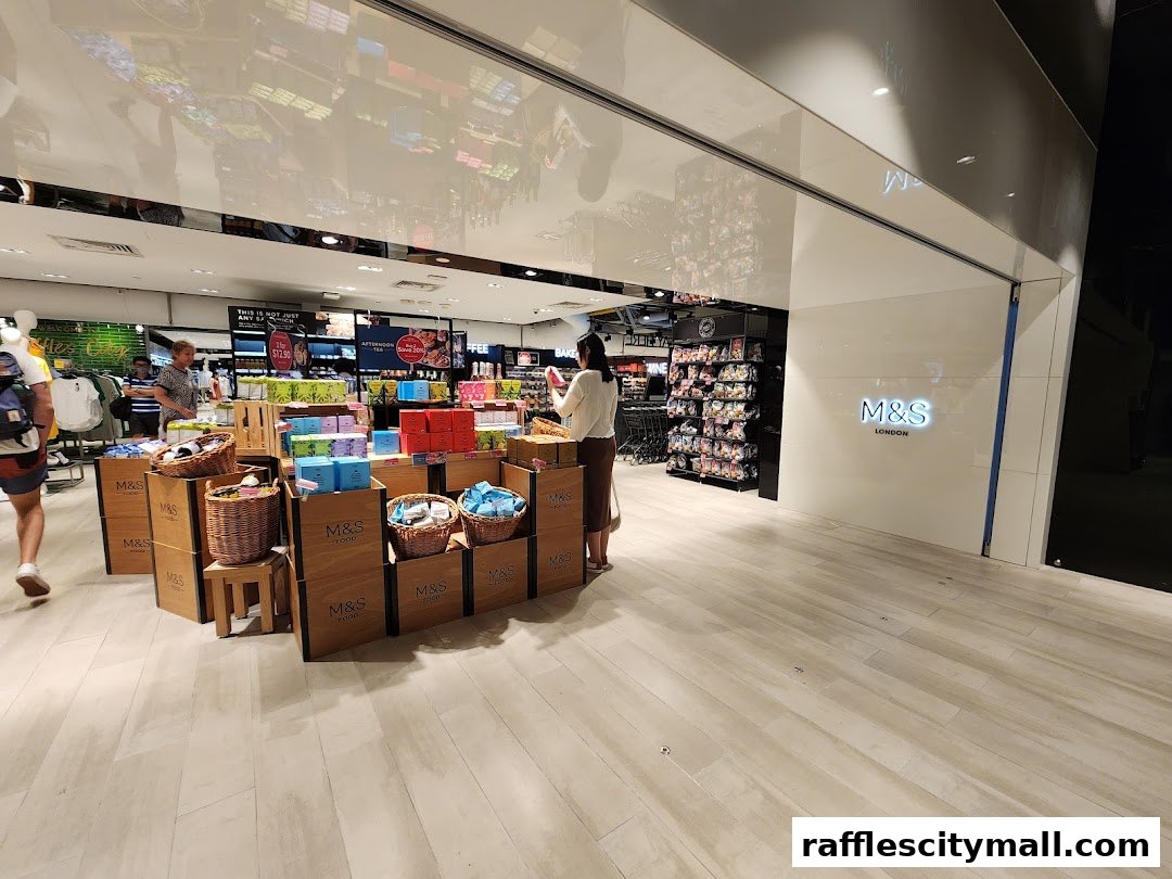 Interior view of a Marks & Spencer store showcasing food products and clothing displays.