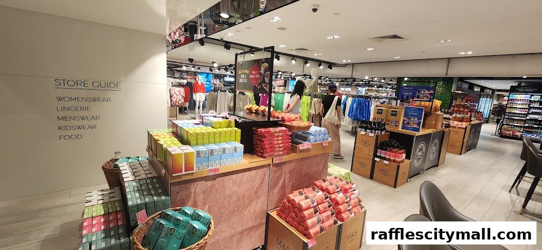 Interior view of a Marks & Spencer store showcasing clothing and food items.