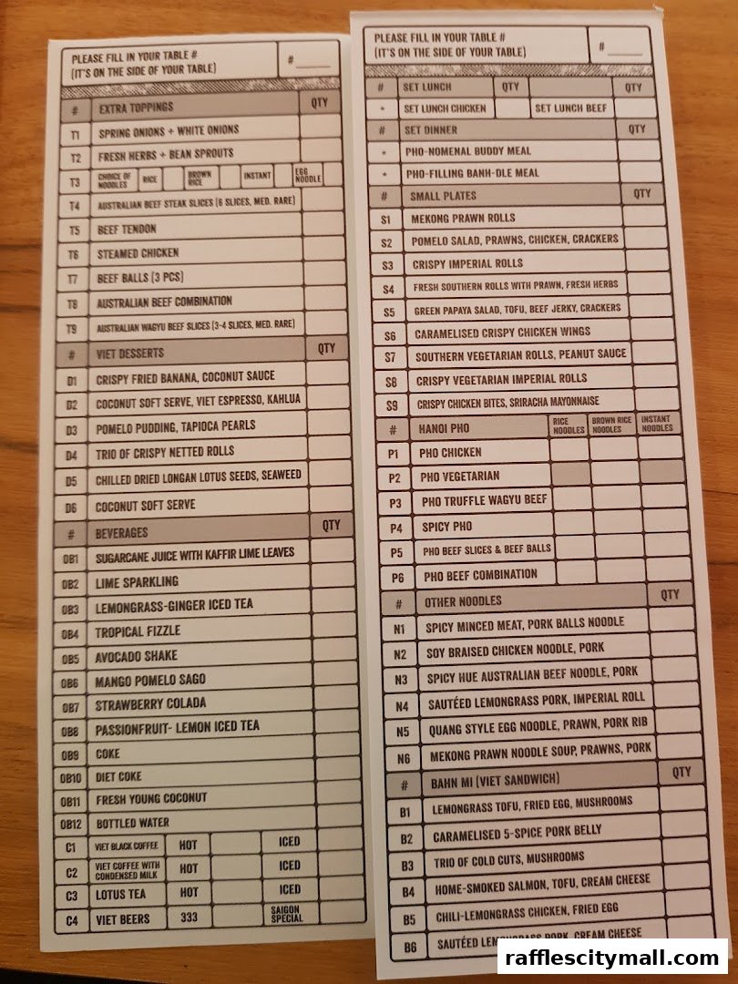 A menu from NamNam Raffles City featuring Vietnamese dishes, drinks, and desserts.