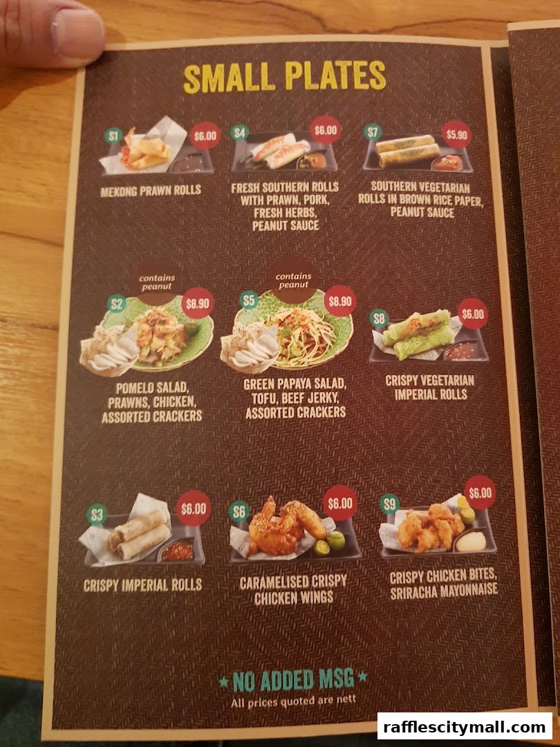 A menu page displaying various small plate dishes with prices and descriptions.