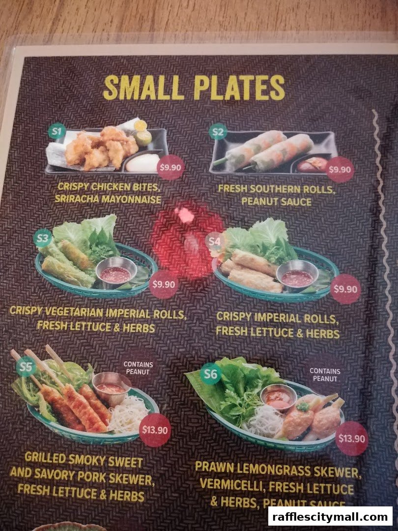 A menu page displaying various small plate dishes with prices and descriptions.