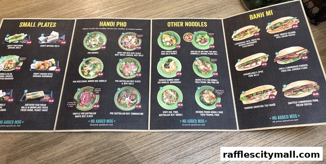 A menu from NamNam Raffles City featuring Vietnamese dishes like Pho, noodles, and Banh Mi.