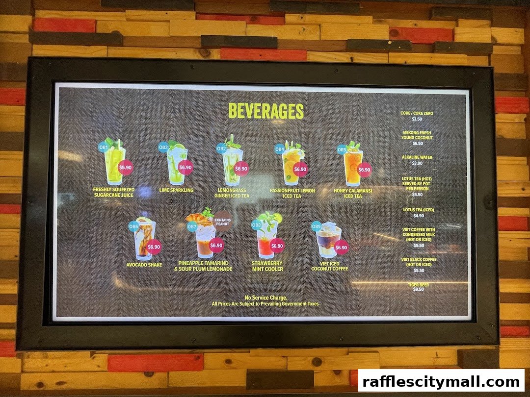 A digital menu board displaying various beverages with prices and images.