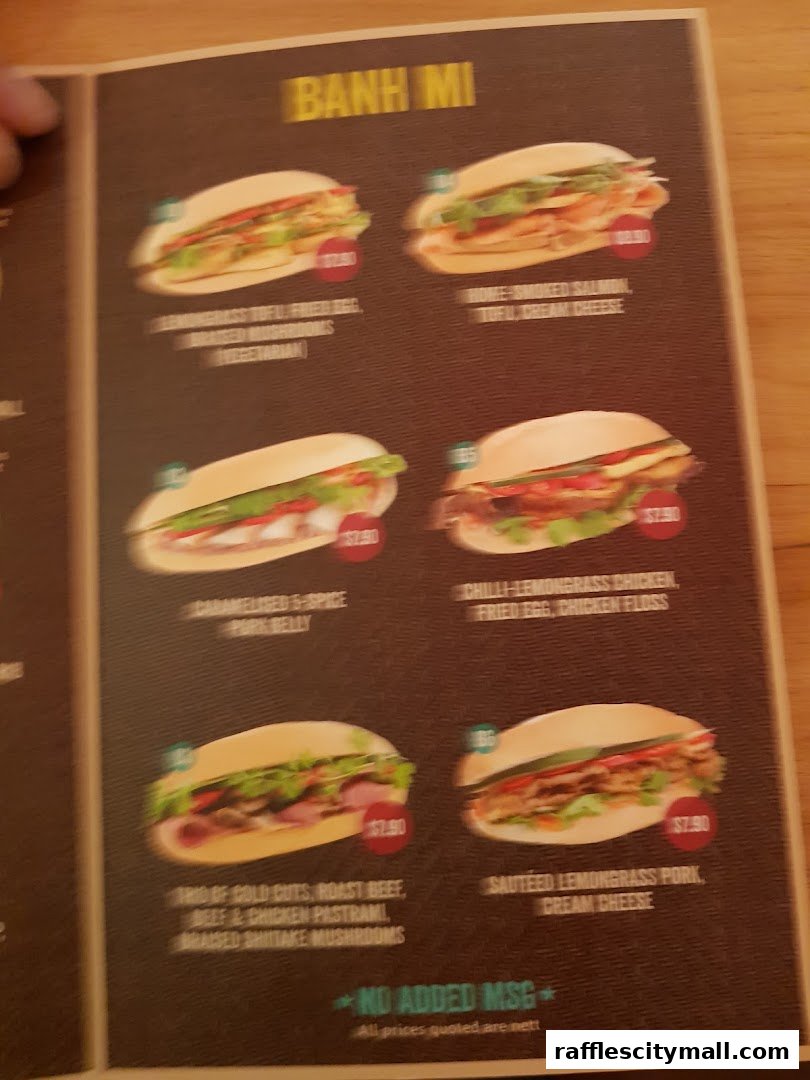 A menu showcasing various Banh Mi sandwiches with descriptions and prices.