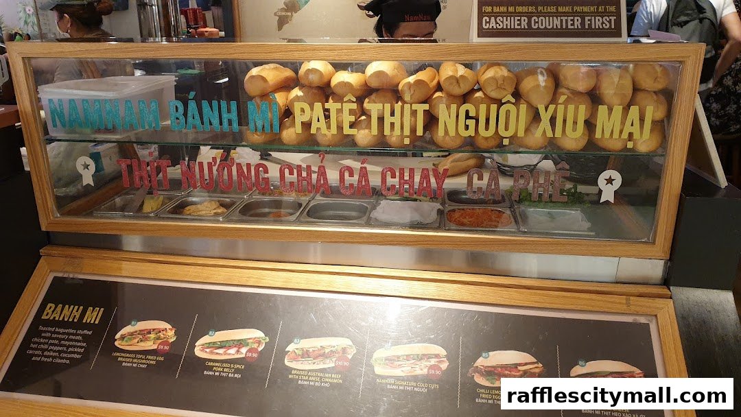 A display case filled with banh mi ingredients and a menu board showing various banh mi options.