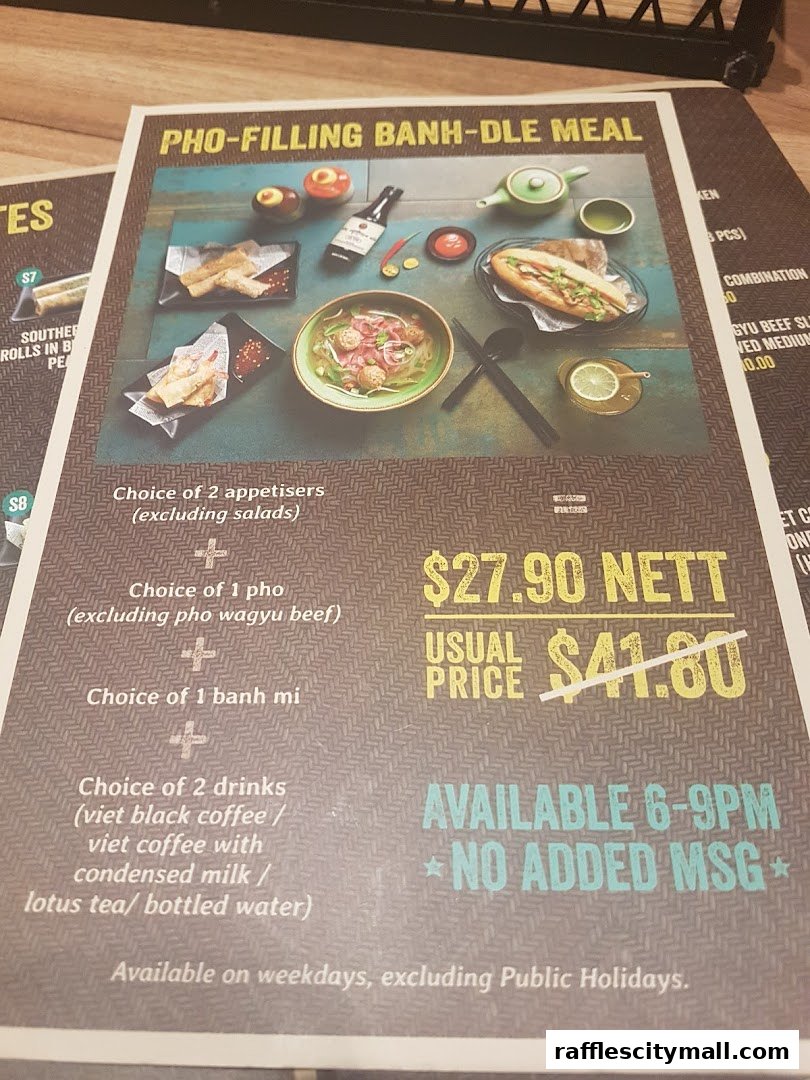 A menu offering a Pho-Filling Banh-dle Meal with choices of appetizers, pho, banh mi, and drinks.