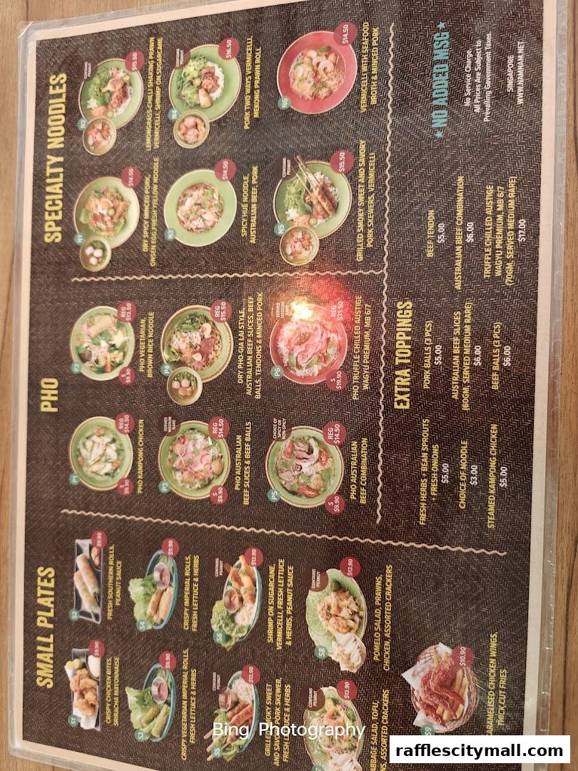 A menu from NamNam Raffles City featuring Vietnamese dishes like Pho and Specialty Noodles.